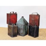 Five vintage metal petrol cans, comprising a BP can,