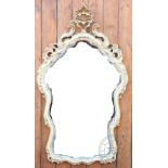 An 18th century style Italian painted wall mirror, of cartouche form,