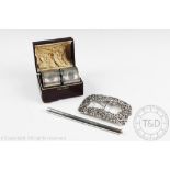 A selection of silver comprising; a Dutch silver buckle,