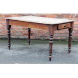 A Victorian pitch pine country kitchen table, with side drawer, on turned legs,