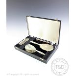 A cased silver vanity set, W I Broadway & Co, Birmingham 1990/1,