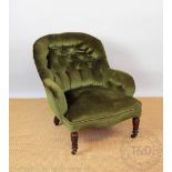 A Victorian tub chair, with button back green upholstery, on turned legs,