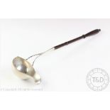 A Scandinavian silver toddy ladle, probably Frederik Fabritius (Danish), with turned wood handle,