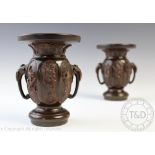A pair of Japanese bronze vases, Meiji period (1868-1912),