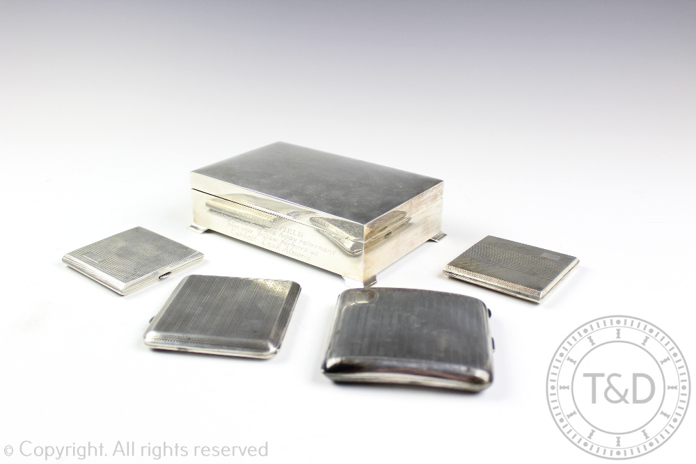 A selection of silver comprising; two Art Deco compacts, each with engine turned detailing,