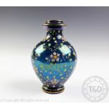 A late 19th century Bohemian glass vase in the manner of Moser,