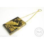 A Japanese black and gilt niello work Komai style lady's powder compact, circa 1950,