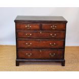 A George III and later oak and walnut inlaid chest, of two short and three graduated drawers,