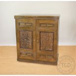 A Chinese carved burr wood cocktail cabinet,