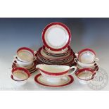 A late Victorian Royal Worcester 'Regency' dinner service comprising; six dinner plates,