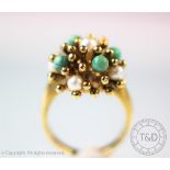 A turquoise and untested pearl set dress ring,