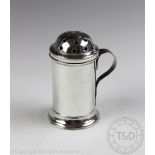 An English silver plate flour dredger, circa 1800, with pierced domed lid and strap handle, 10.