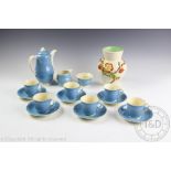 A Clarice Cliff Art Deco fifteen piece coffee service, in powder blue, printed black marks,