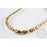 A 9ct yellow gold heart link necklace,