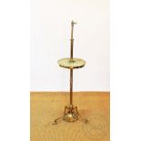 An early 20th century brass and onyx adjustable standard lamp,