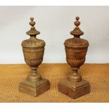 A pair of carved and turned pine finials, of 18th century Adam style, baluster form,
