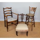 An Edwardian mahogany wall mirror, with an oval wall mirror, a chair,