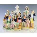 A collection of twelve Staffordshire Figural groups to include; three pairs of cricketers 16cm H,