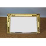 A Victorian gilt wood and gesso over mantle mirror,