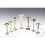 A selection of seven silver posy vases to include a large George V example, William Devenport,