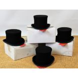 Four Christies of London wool top hats, sized on boxes: 7 1/8, 7, 67/8,