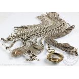 A collection of seven silver watch albert chains, gross weight 287.