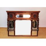 A Victorian mahogany over mantle mirror, with bevelled seet mirrors within carved floral details,