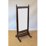 An Edwardian mahogany cheval mirror, with reeded frame,