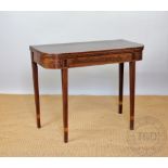 A George III mahogany tea table, on tapered square legs,