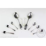 A selection of assorted flatware comprising; two silver fiddle pattern table spoons,