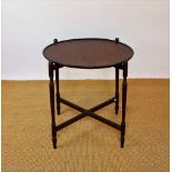 A late 19th century mahogany folding tea table, with dished circular top,