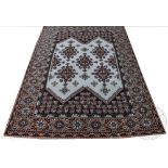 A North African wool carpet, worked with a thick pile,