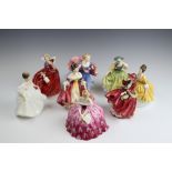 Eight Royal Doulton figures,