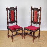 A set of six Victorian carved oak dining chairs,