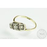 A three stone diamond ring,