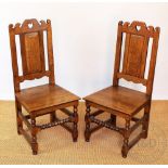 A set of twelve 18th century style golden oak dining chairs,