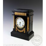 A late 19th century American ebonised mantel clock,