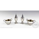 A pair of Victorian silver peppers, James Deakin & Sons, London 1897,