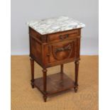 A French carved walnut bedside table,