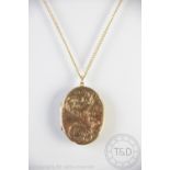 A 9ct yellow gold oval locket and chain,