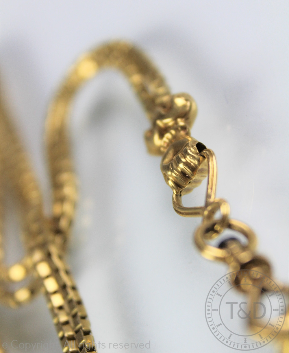 A Victorian yellow metal long chain with attached propelling pencil, - Image 3 of 3