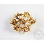 An 18ct gold, diamond and untested pearl set brooch, import mark for 1968 and stamped 'Asia 750',