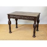 A Victorian carved oak hall table, of 17th century style, with two drawers,
