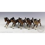 Five Beswick foals (small, stretched, facing right), model number 815,