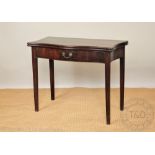 A George III Hepplewhite style serpentine mahogany tea table, with faux drawer,