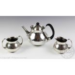 A silver plated Elkington three piece Art Deco style tea service, designed by Eric Clements,