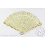 A Chinese Canton export bone brise fan, 19th century, pierced with floral sprays,