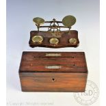 A Victorian rosewood household letterbox, with twin compartmented interior,