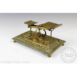 A pair of late Victorian brass postage weighing scales,