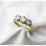 A three stone diamond ring,